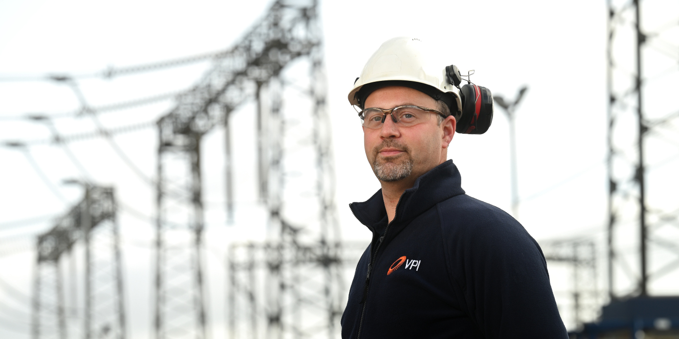 Engineer in from of transmission station